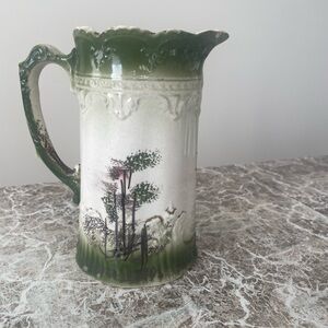 Elegant Green and White Ceramic Pitcher